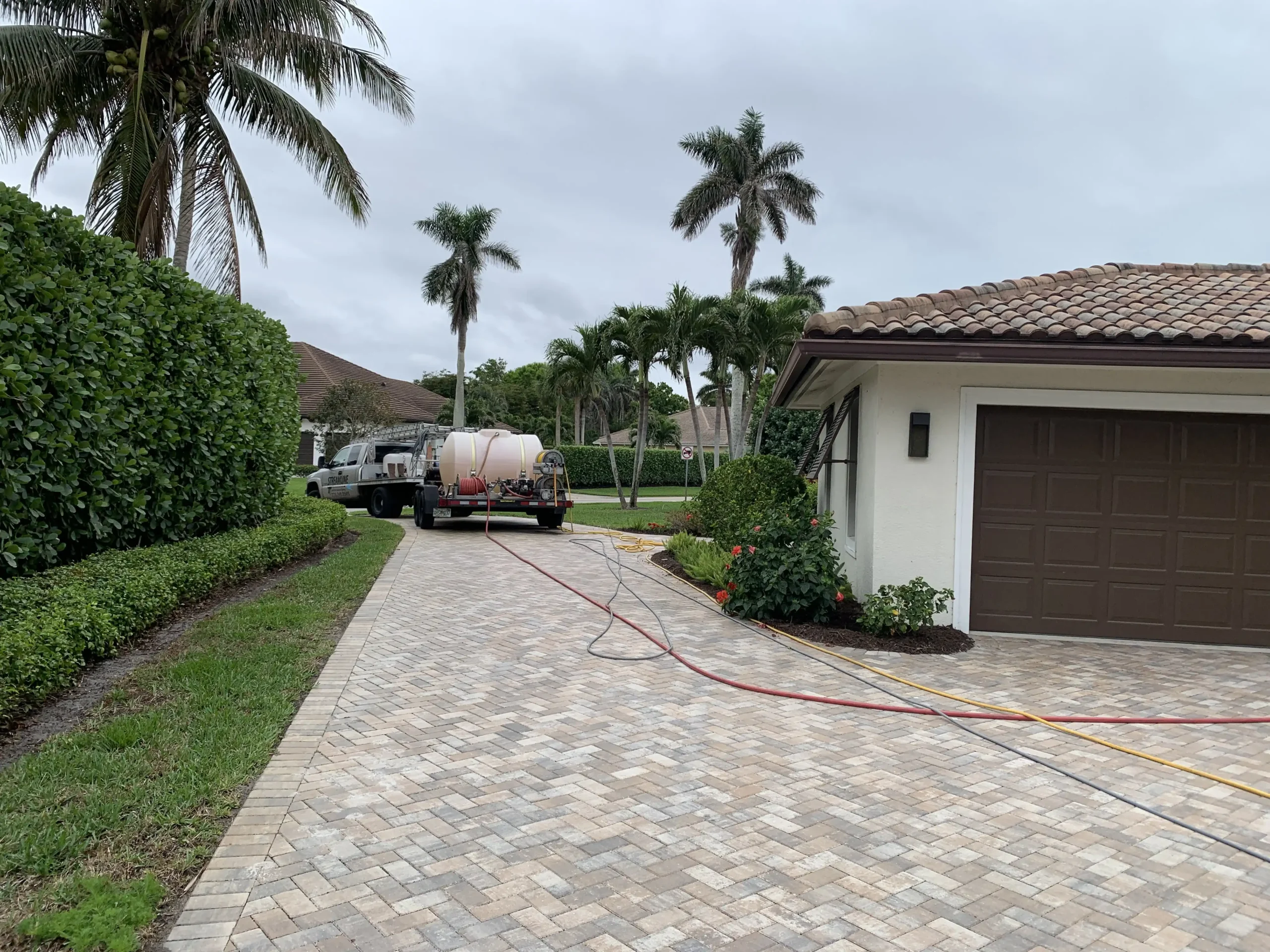 Driveway Pressure Washer Naples FL — Wash & Glow 2 - Year Guarantee